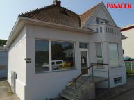 Pron�jem  domu  Zl�n  obchodn� prostory  s bydlen�m