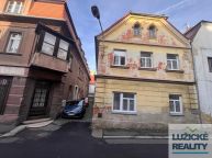 Pron�jem rodinn�ho domu  �esk� Kamenice, centrum m�sta