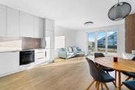 Pron�jem bytu 2+kk, 55 m2 se zahr�dkou a parkovac�m st�n�m v Pasohl�vk�ch