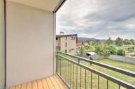 Sv�tl� byt s balkonem, polovinou gar�e a �lo�n�m prostorem.. Dob�ichovice, Praha-Z�pad